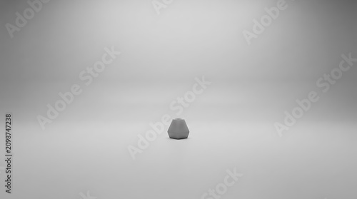 Minimalist studio gray seamless backdrop with soft shadow gradient. Neutral photography background for clean product or portrait display.