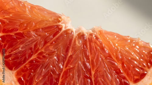Vibrant detailed macro shot of fresh blood orange fruit pulp and segments