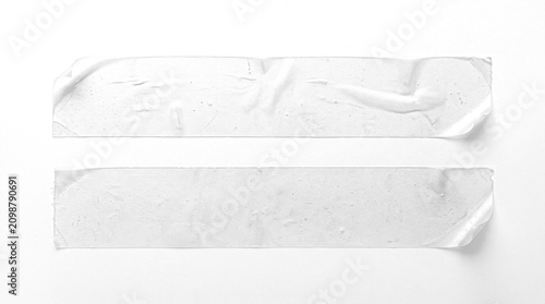 Photography Two clear wrinkled adhesive cellophane tape strips on a transparent background