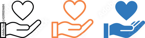 Photos Three hands holding hearts in different colors