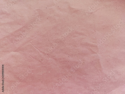 Pink crumpled paper old texture background