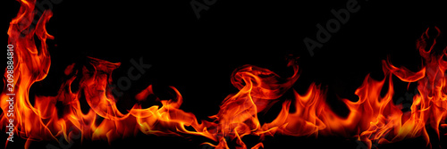 Obraz na plátně Fire flames on Abstract art black background