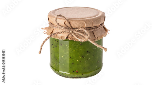 Konstfotografi Glass jar filled with green pesto sauce condiment isolated on transparent backgr