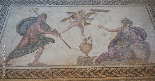 Mosaic art. Poseidon (with trident) and Amymone, winged Eros in center above amphora, floor of “House of Dionysus”. Paphos, Cyprus.