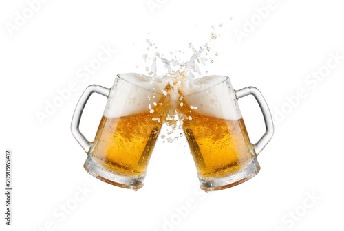 Two glass mugs filled with golden beer clinking together, creating a refreshing splash with foam, symbolizing celebration and fun.