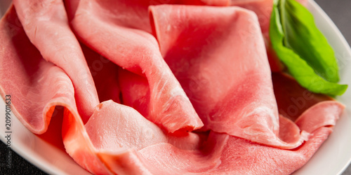 Pork ham slice meat natural healthy food tasty snack fresh delicious gourmet food background on the table rustic food top view copy space