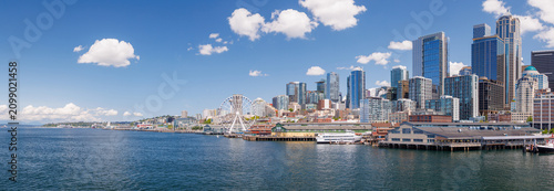 Bright and sunny panoramic view of Seattle skyline from the water