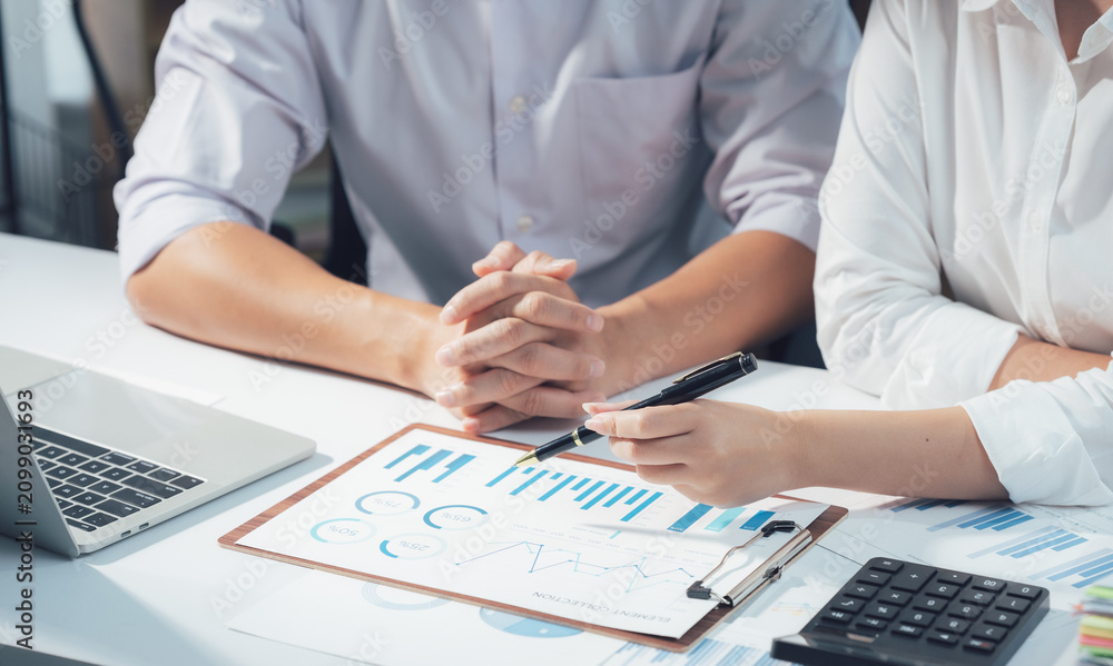 Fototapeta premium economic concepts Business and partner plan data analysis to determine the direction of the company's business investment in the workplace. Night Marketing Consultant Concept 