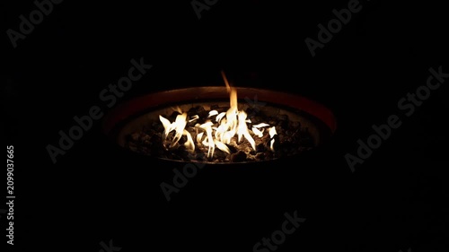 View of camp fire at night time.