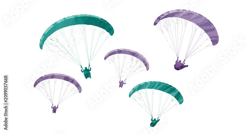 Group of Paragliders Soaring in the Sky
