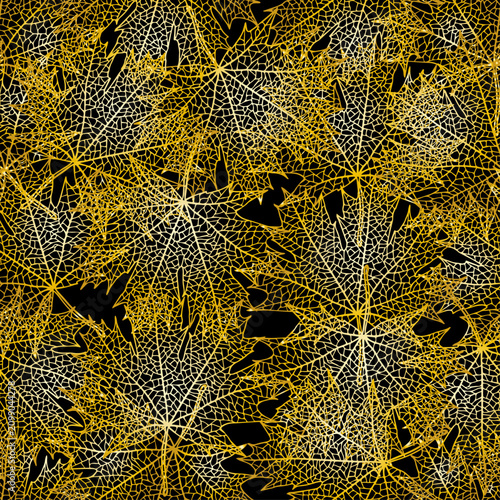Seamless continuous pattern of gold gradient maple leaves in a grid on a black  background.eps