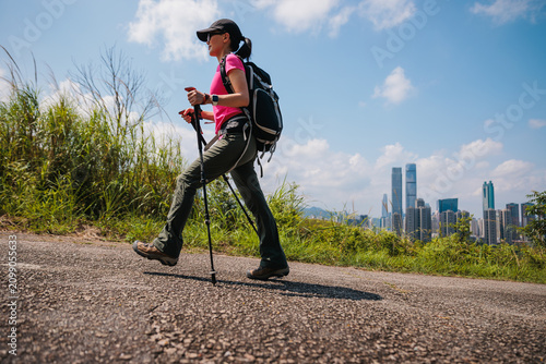 Photography Woman hiking on mountain top in Hong Kong