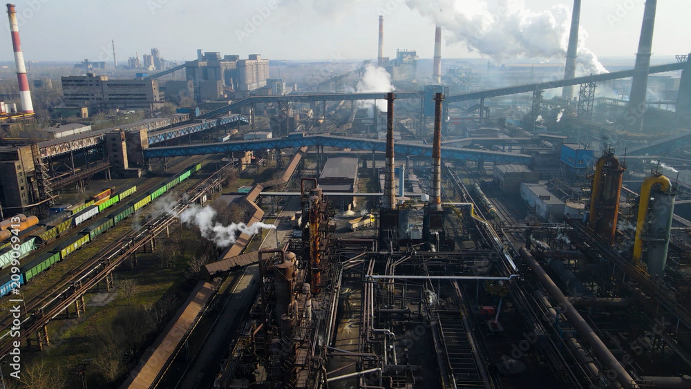 Obraz premium Factory, industrial enterprise, metallurgical plant, smoke from chimneys, aerial photography from a drone.