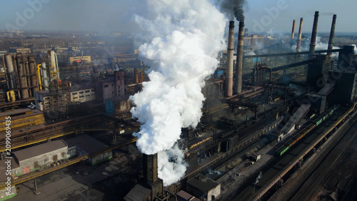 фотографія Factory, industrial enterprise, metallurgical plant, smoke from chimneys, aerial photography from a drone