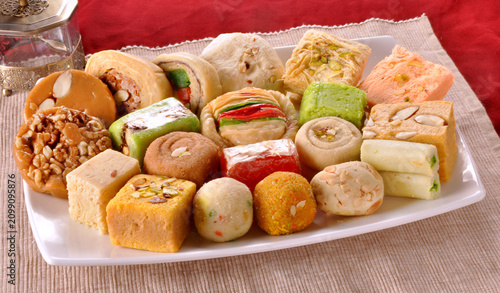 Schilderij op canvas Mix Mithai or Mix Sweets, a group of delicious Pakistani, Indian & Bangla sweets