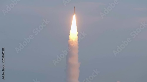 Swift takeoff of a ballistic missile from the launch pad. Vertical liftoff of the intercontinental range missile
