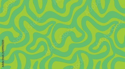 фотографія A vibrant abstract pattern of swirling green shapes fills the entire frame