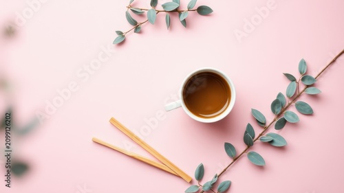 Serene Minimalist Flatlay Coffee, Branches, and Chopsticks on Pink