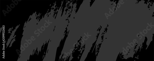 Foto Abstract dark gray paint brush stroke and texture on a black background