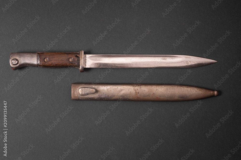 Fototapeta premium Vintage Military Bayonet with Metal Scabbard