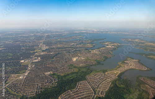 Texas Sprawl: High-Altitude Aerial View of Lewisville Lake and Surrounding Residential Subdivisions near Dallas, Texas