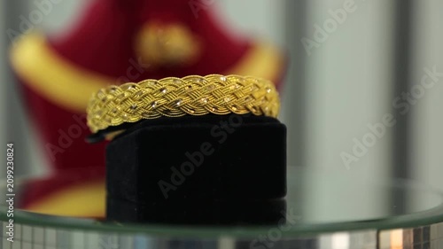 Gold Bangle with Ornamental Pendant