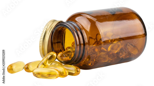 Fotografie Amber glass bottle of transparent yellow fish oil capsules spilling out, nutritional supplement