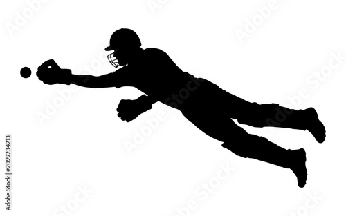 Fényképezés Silhouette of a male cricket wicketkeeper or fielder diving horizontally in mid-