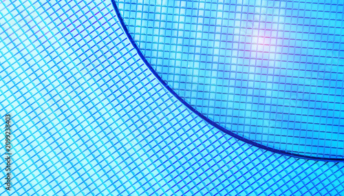 Φωτογραφία blue silicon wafer for manufacturing semiconductor of integrated circuit