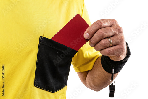 Photography Soccer referee taking red card from his shirt pocket