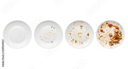 Fotografía Empty porcelain plates with food residues and stains