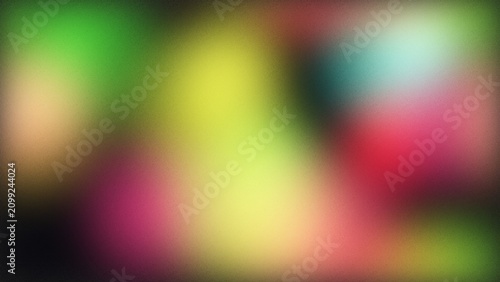 Abstract blurred background with soft blending of vibrant green red and yellow colors