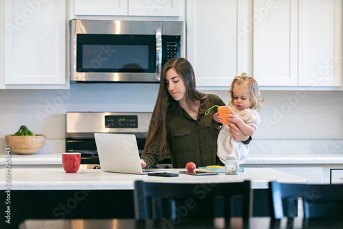 Mother Overloaded With Kids And Work
