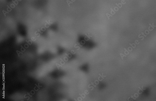 Фотография Abstract dark inkblot on textured background