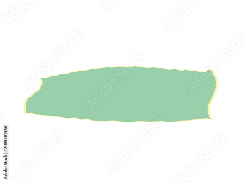 A light green paper scrap with irregular torn edges and yellow highlights