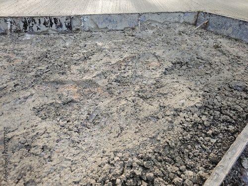 Canvastavla Construction site shows freshly laid concrete with uneven surface in a work area