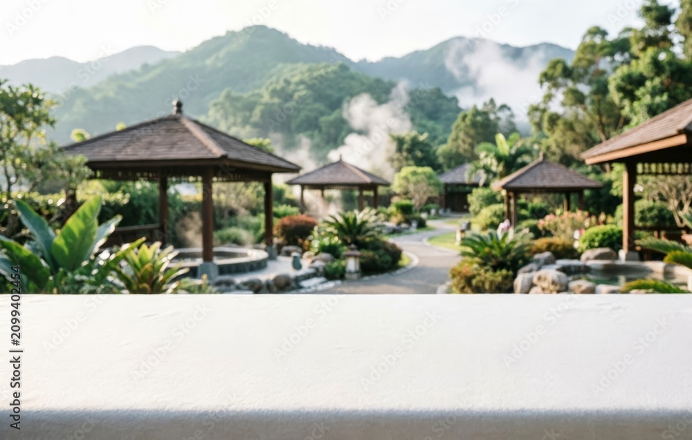 Obraz premium Serene Garden with Wooden Gazebos and Misty Mountains for Wellness Design