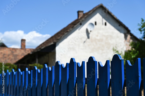 Fotografie painted blue wood picket fence