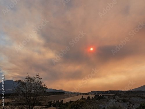 Sky covered in smoke from a fire in the province of Huesca, Aragon, Spain