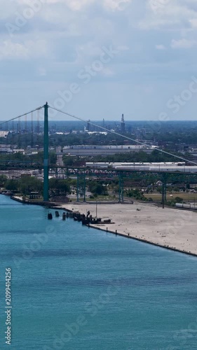 Aerial footage of a gorgeous landscape along the Detroit River in Detroit Michigan USA