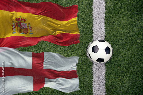 Fotografie Soccer ball and the flag of England and Spain