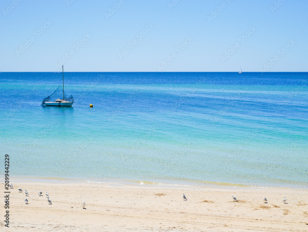 Fototapeta premium Yacht in blue sea