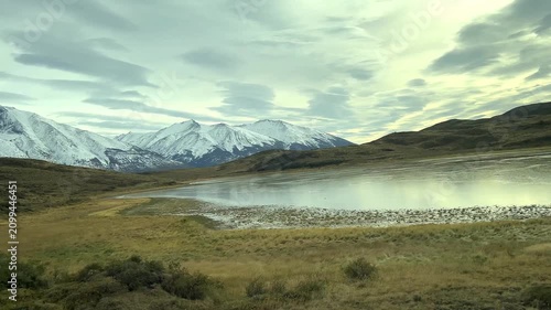 Cinematic view of mountains, rivers and pristine landscapes in Chilean Patagonia under daylight. Untouched wilderness with dramatic peaks, valleys and natural scenery in southern Chile.