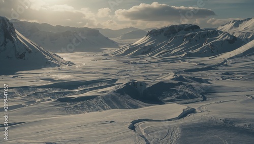 Icebergs Float in a Calm Sea Near Tall Mountains in a Bright Daylight Scene