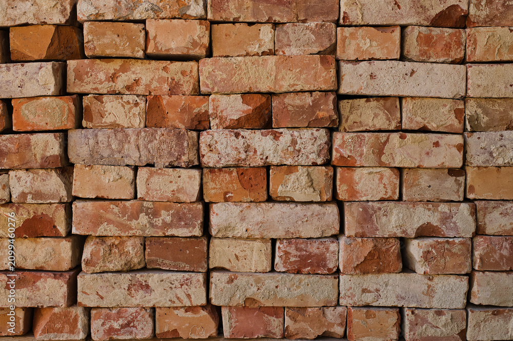 Fototapeta premium Front view of old brick pile