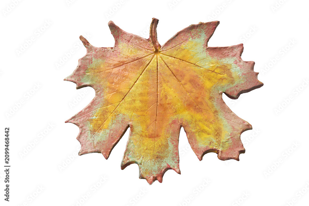 Fototapeta premium Pottery hot pad in the shape of an autumn maple leaf. Png.