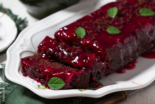 Slika na platnu Chocolate Cherry Loaf Cake with Cherry Sauce and Fresh Mint Garnish