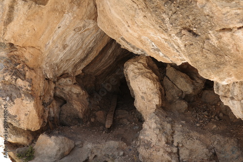 Obraz na plátně Natural Cave Opening in Weathered Limestone Rock