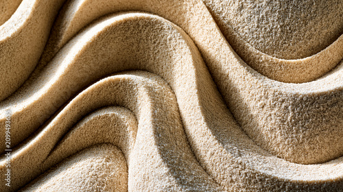 Closeup of textured beige sand forming elegant, rhythmic wave formations