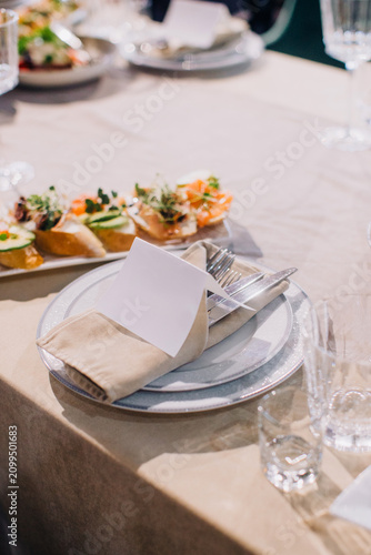 Elegant table setting with blank place card at event